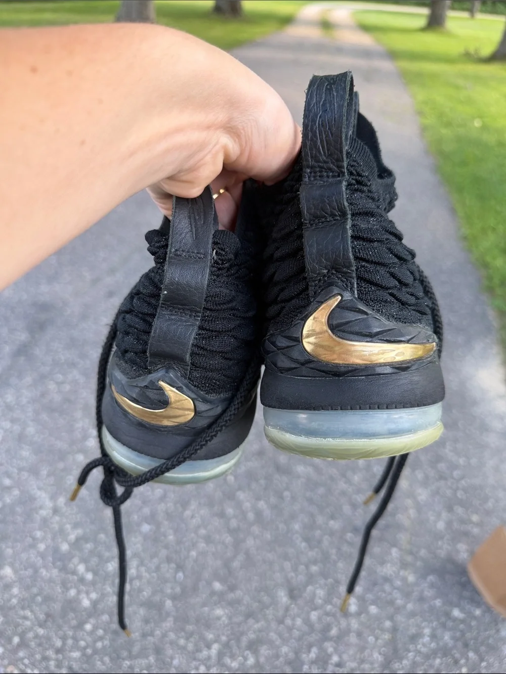 Nike Women's Black Knit Athletic Sneakers with Gold Accents